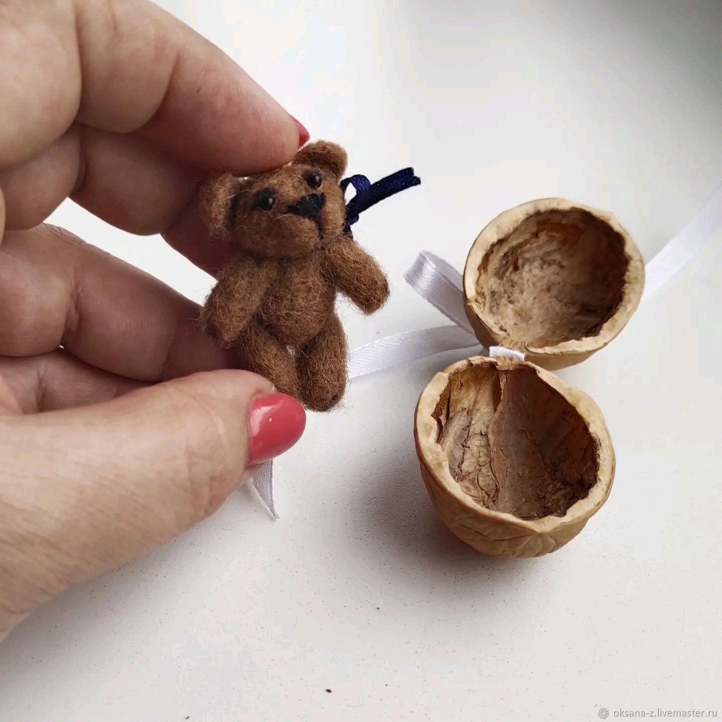 Handmade crochet animal in walnut shell