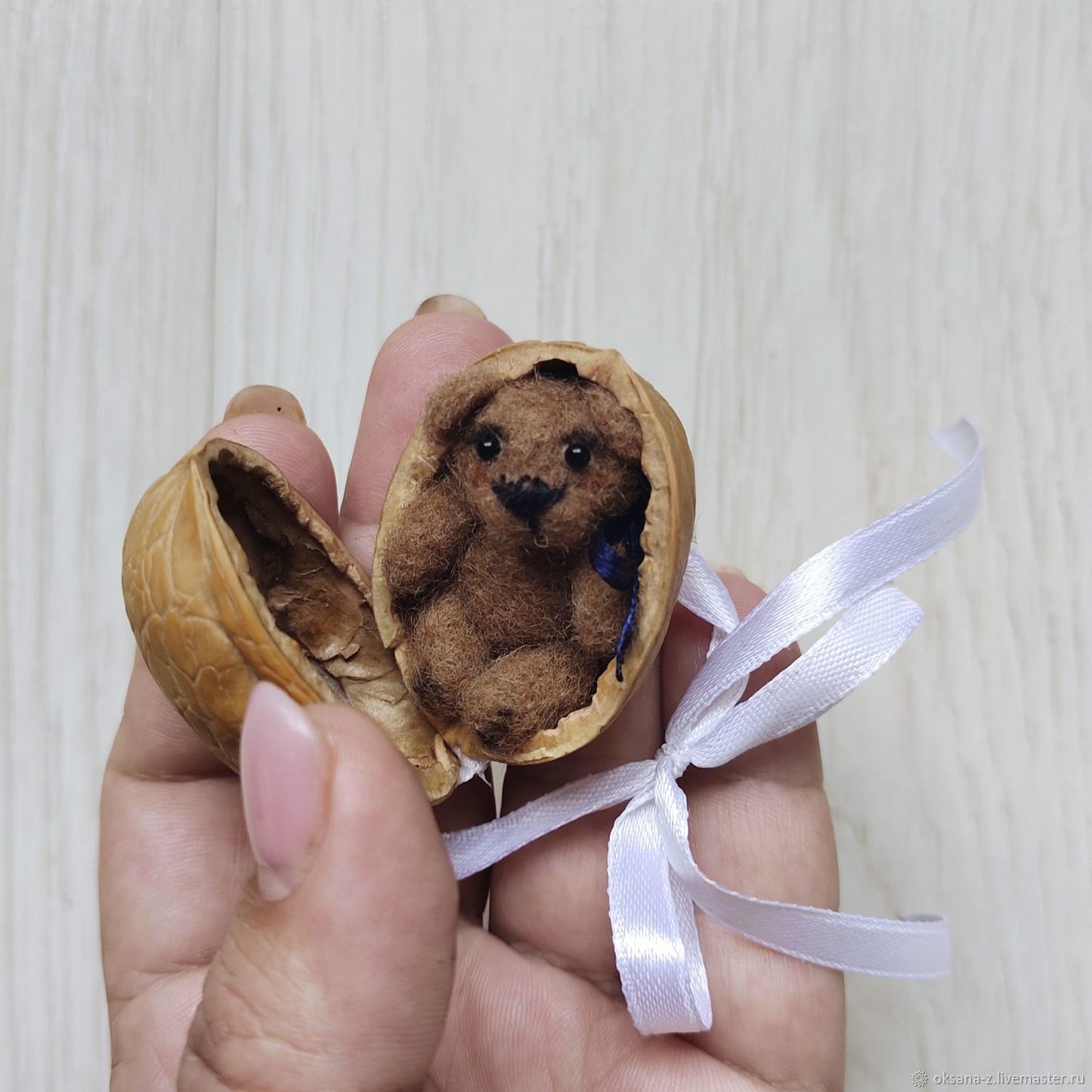 Handmade crochet animal in walnut shell